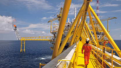 worker on rig at sea