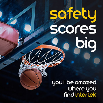 A basketball falling through the net